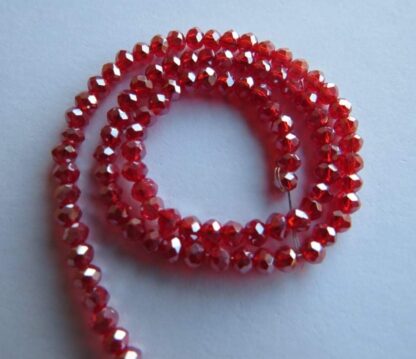 Faceted Crystal Rondelles – Red Lustre – 3x2mm – Strand Of 100 Beads