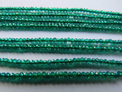 Faceted Crystal Rondelles – Dark Green – 2×1.5mm – Strand Of 240 Beads